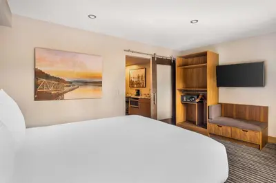 a hotel room with a bed and a tv at Hilton Vacation Club Tahoe Seasons Lake Tahoe in South Lake Tahoe