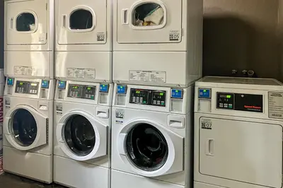 a bunch of washing machines in a laundry room at Chamonix 100 in Mammoth Lakes