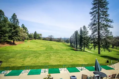 a golf course with a bunch of green courses at Great Escape Cabin (08/253) in Groveland