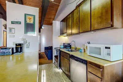 a kitchen with a sink and a microwave at Dollar Hill 2 Dreamcatcher in Dollar Point