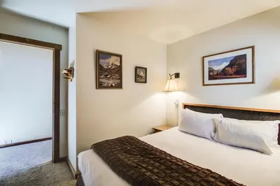 a hotel room with a bed and a window at Northstar Ski Trails in Truckee