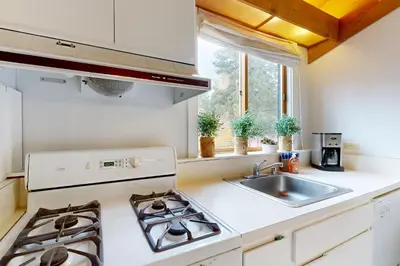 a kitchen with a stove and a sink at Gold Bend 5034 in Truckee