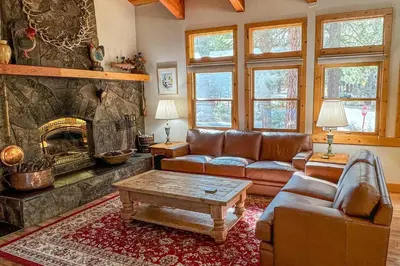 a living room with a couch and a fireplace at 1225 Gold Bend in Truckee