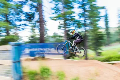 a person on a bike jumping in the air at Aspen Grove Studio at Northstar in Truckee