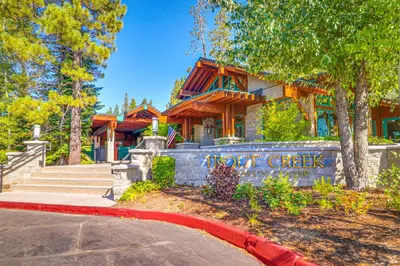 a house with a sign in front of it at Snowpeak Chalet in Tahoe Donner in Truckee