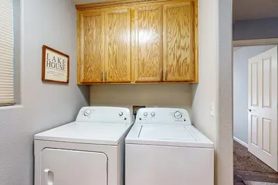 a laundry room with a washer and dryer at Wanderlust Cabin in Kings Beach