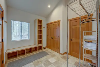 a bathroom with a shower and a walk in closet at Beaver Pond Northstar Luxury Chalet with Hot Tub in Truckee