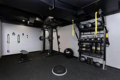 a room with a gym with equipment on the wall at Courtyard by Marriott Reno in Reno