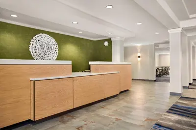 a lobby with a reception desk in a building at Fairfield Inn & Suites by Marriott Reno Sparks in Sparks