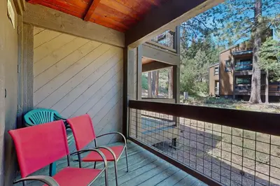 two chairs and two windows on a porch at Silver Strike at Northstar in Kingswood Estates