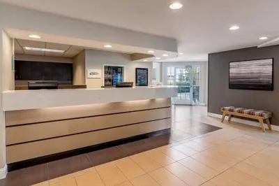 a lobby of a hospital with a reception counter at Residence Inn Sacramento Rancho Cordova in Rancho Cordova
