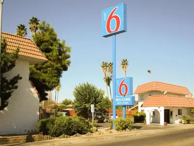 a sign for a mexico gas station at Motel 6-Fresno, CA in Fresno