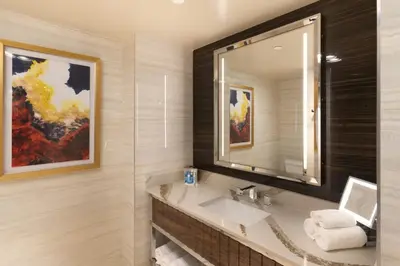 a bathroom with a sink and a mirror at Grand Sierra Resort and Casino in Reno