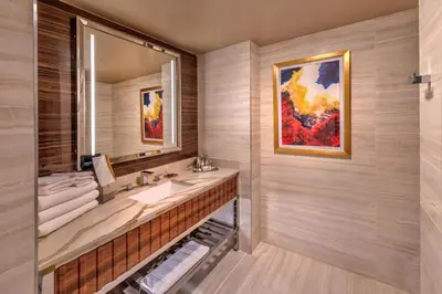 a bathroom with a sink and a mirror at Grand Sierra Resort and Casino in Reno