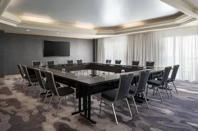 a conference room with a large table and chairs at Visalia Marriott at the Convention Center in Visalia