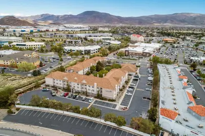 an aerial view of a town with mountains in the background at Sonesta ES Suites Reno in Reno