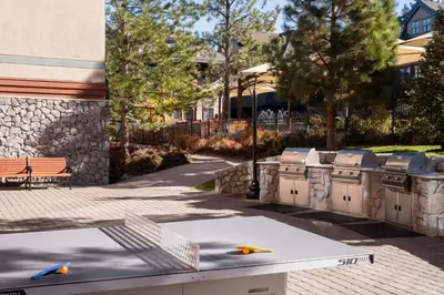 a ping pong table in front of a building at Marriott's Timber Lodge in South Lake Tahoe