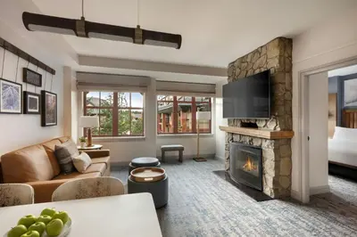 a living room with a couch and a fireplace at Marriott's Timber Lodge in South Lake Tahoe