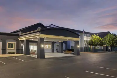 a building with a parking lot in front of it at Fairfield Inn Sacramento Cal Expo in Sacramento
