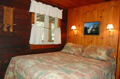 a bedroom with a bed and a window at 18 Le Fawn in North Wawona