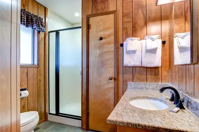 a bathroom with a sink and a toilet at 23B Robins Nest in North Wawona