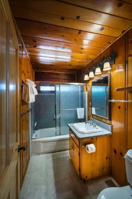 a bathroom with a sink and a bath tub at 72 Sequoia in North Wawona