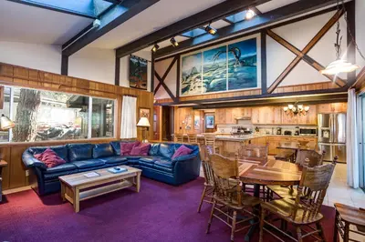 a living room with a couch and a table at 15B The Legacy in Wawona