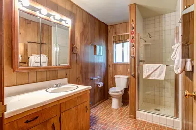 a bathroom with a sink and a toilet and a shower at 4B Mountain Memory in Wawona