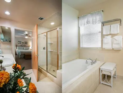 a bathroom with a bath tub and a bedroom at 2A The Terry Cabin in North Wawona