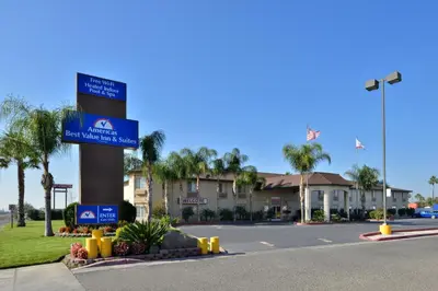 a street sign on the side of a road at Americas Best Value Inn & Suites Madera in Madera