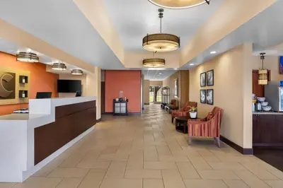a lobby of a hospital with chairs and a waiting room at Comfort Suites Clovis - Fresno in Clovis