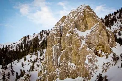 a large rocky mountain with snow on it at Mammoth Pines 11 in Mammoth Lakes