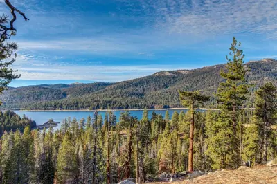 a view of a lake in the mountains at Huntington Lake Condo 92 in Lakeshore