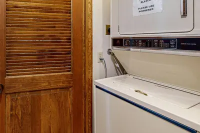 a kitchen with a microwave and a refrigerator at Tahoe City Retreat in Lake Forest