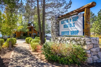 a sign for the inn of surf rentals coffee shop at Tahoe City Retreat in Lake Forest