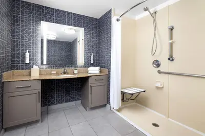 a bathroom with a sink and a shower at Homewood Suites by Hilton Sacramento/Roseville in Roseville