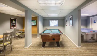 a pool table in a room with a ping pong ball at WorldMark Lake Tahoe in Stateline