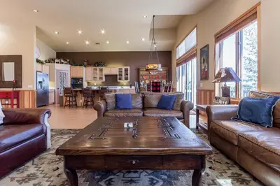 a living room with couches and a coffee table at Snowcreek V 820 in Mammoth Lakes