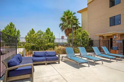 a group of chairs and a couch on a patio at Best Western Plus Coalinga Inn in Coalinga