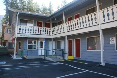 an empty parking lot in front of a building at Thunderchief Inn in South Lake Tahoe