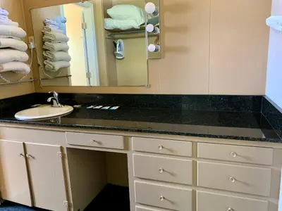 a bathroom with a sink and a mirror at Stevenson’s Inn in Kings Beach