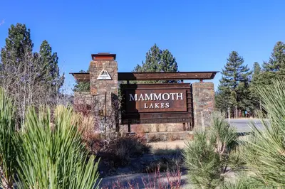 a sign for a manuth leaves sign on a building at Bridges #105 Condo in Mammoth Lakes