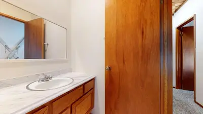 a bathroom with a sink and a mirror at Val D'Isere #6 Condo in Mammoth Lakes