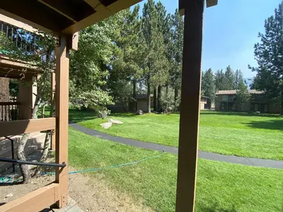 a view of a yard from a porch at Condo de los Pinos #30 in Mammoth Lakes