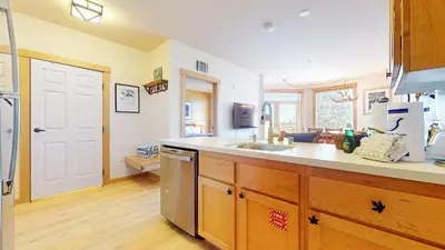 a kitchen with a sink and a counter top at Sunstone #103 Condo in Mammoth Lakes