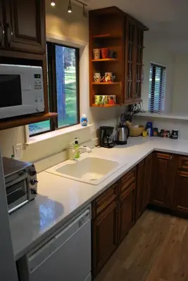 a kitchen with a sink and a microwave at Yosemite is Calling in Groveland