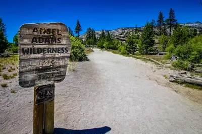 a sign on the side of a dirt road at Mammoth Ski & Racquet Club #131 in Mammoth Lakes