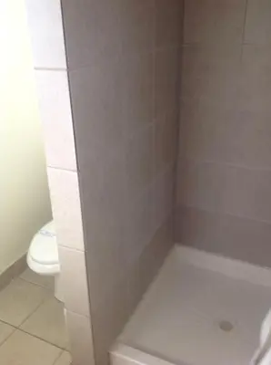 a bathroom with a tub and a toilet at Budget INN At The Heavenly Gondola in South Lake Tahoe