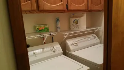 a small kitchen with two sinks at Lovely Mountain Lake Chalet by Yosemite: Equipped! in Groveland