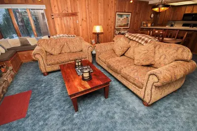 a living room with two couches and a coffee table at Mountainback 45 Den in Mammoth Lakes